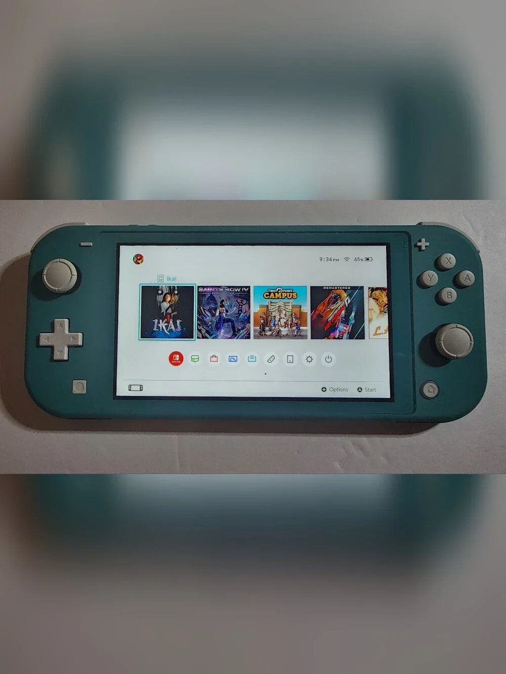 Nintendo Switch Lite Teal Handheld Console